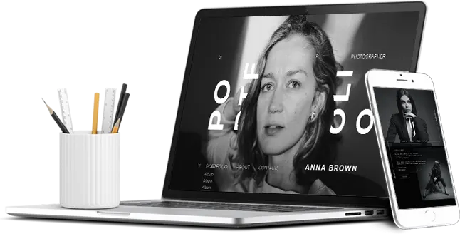 A person using a laptop to design a website